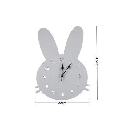 Dimensions d'une horloge en bois grise en forme de tête de lapin